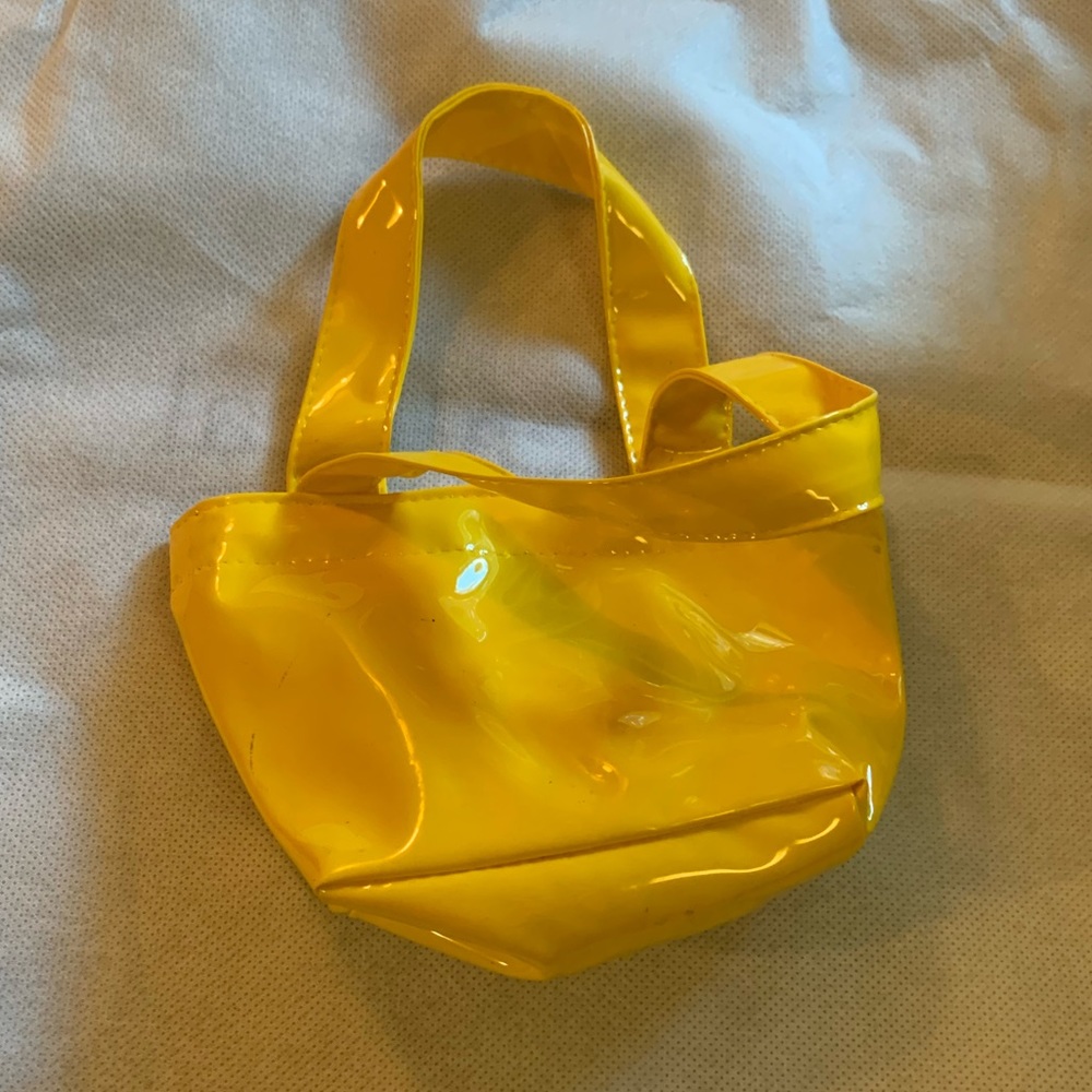 Mini Cynthia Rowley bright yellow tote.